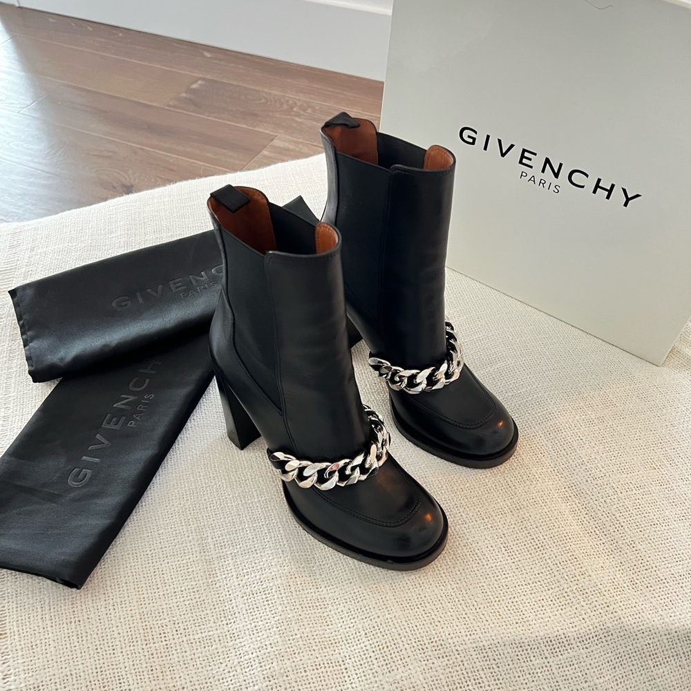 Givenchy black pull on boot with chain detail.
